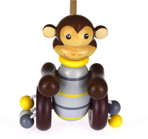 KAPER KIDS PUSH ALONG WOODEN MONKEY image 0